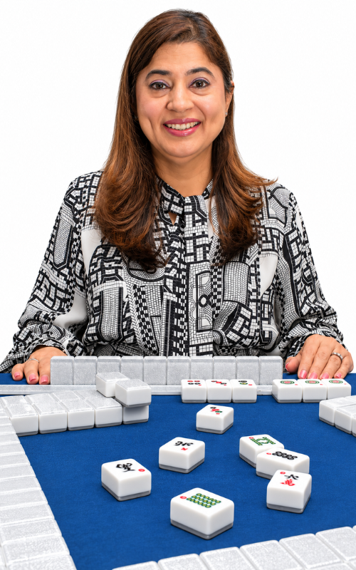 Hashmat Pereira seated at a Mahjong table